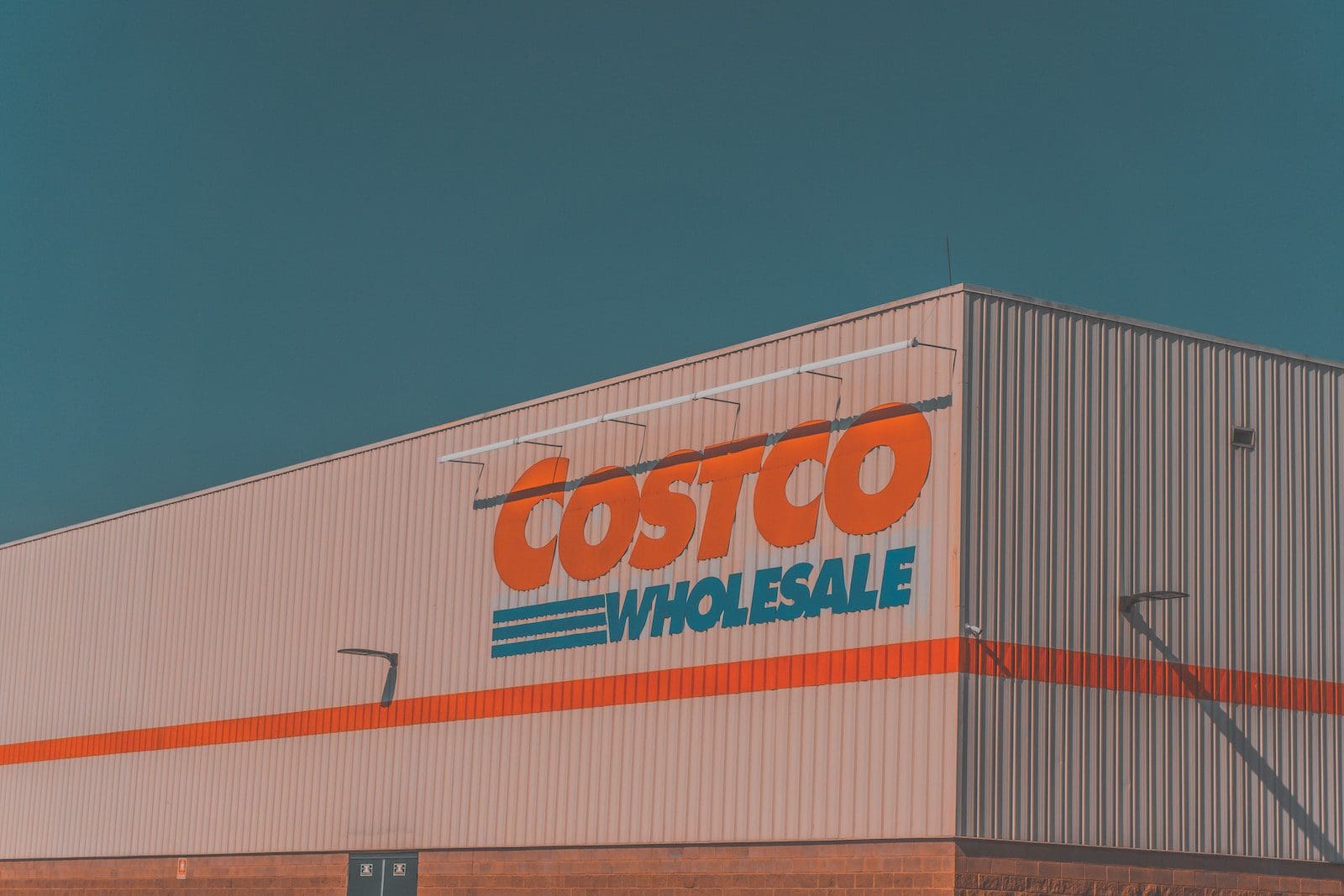 a building with a sign that says costco whole sale